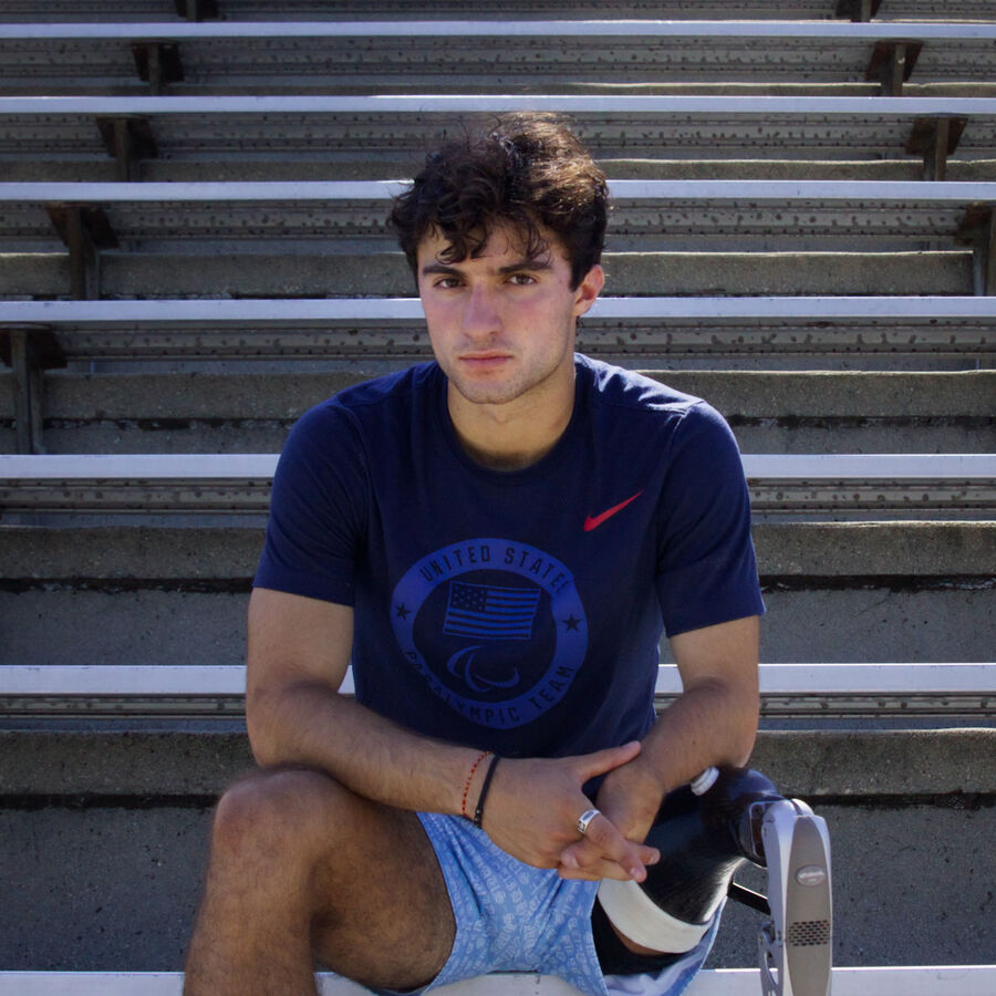 Ezra Frech poses on bleachers
